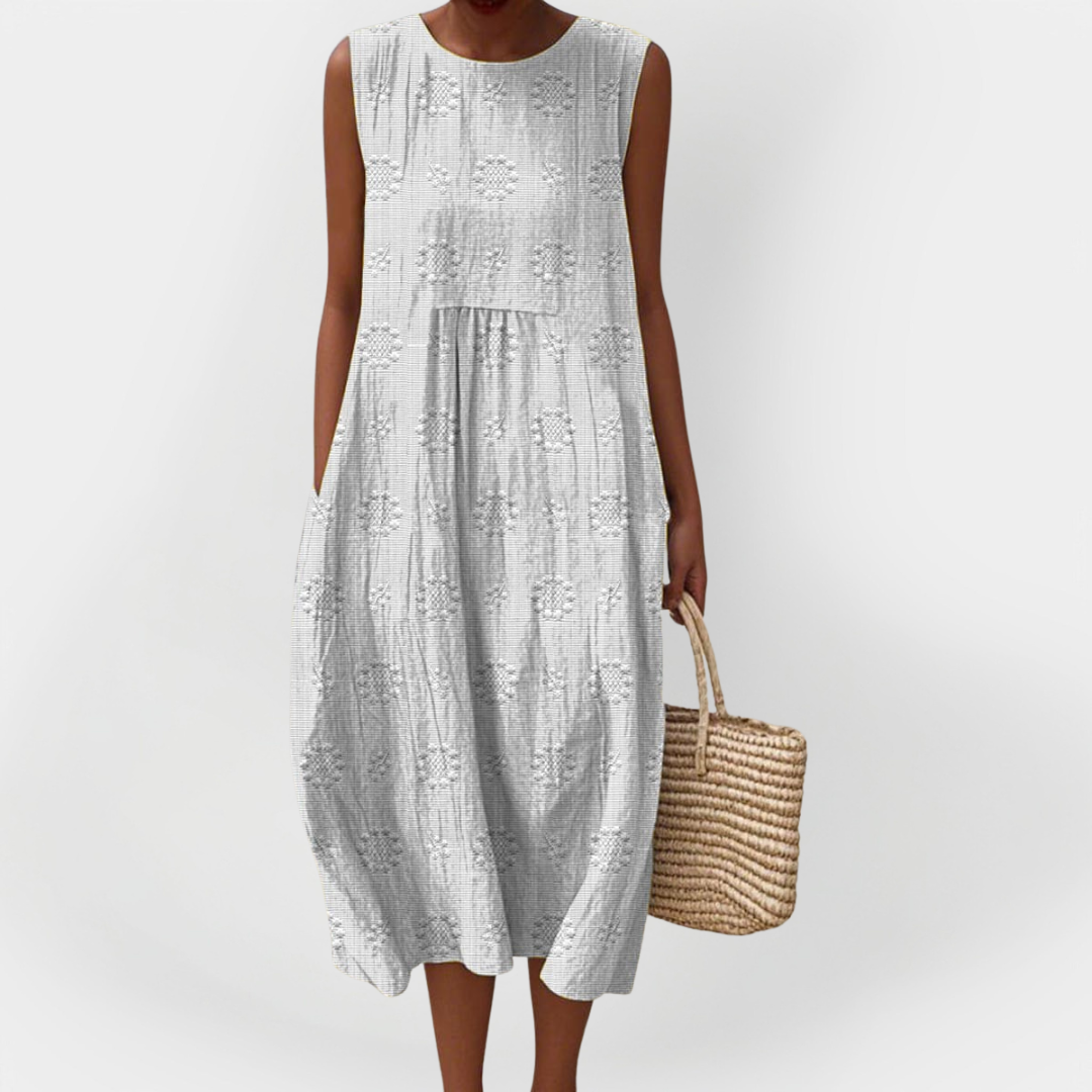 Vestit de cotó sense mànigues elegant amb butxaques
