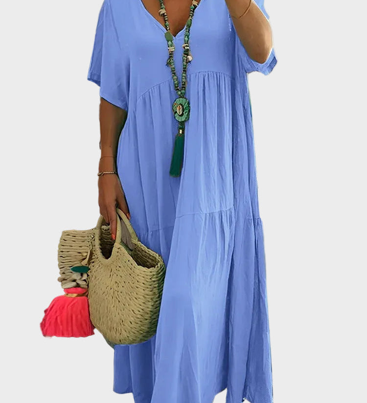 Linnea – Vestit maxi suau amb volants i escot en forma de V