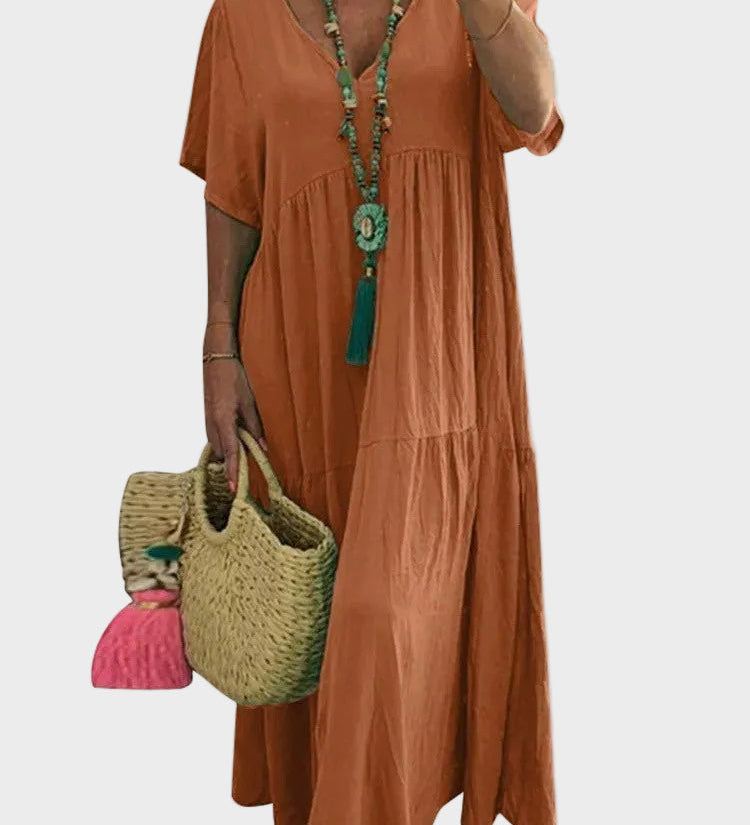 Linnea – Vestit maxi suau amb volants i escot en forma de V