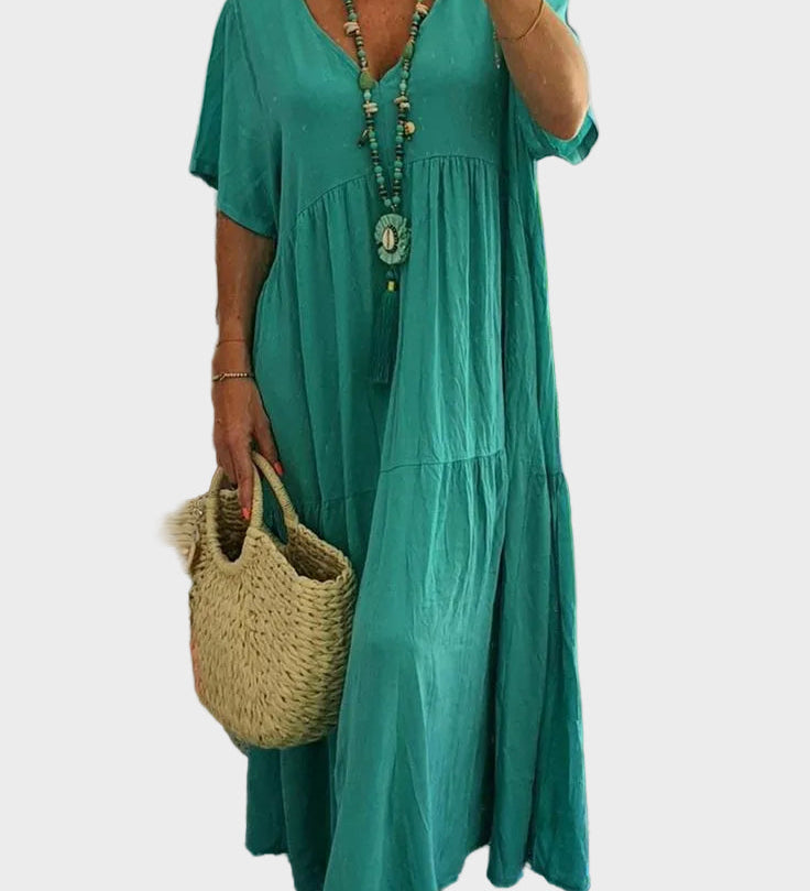 Linnea – Vestit maxi suau amb volants i escot en forma de V