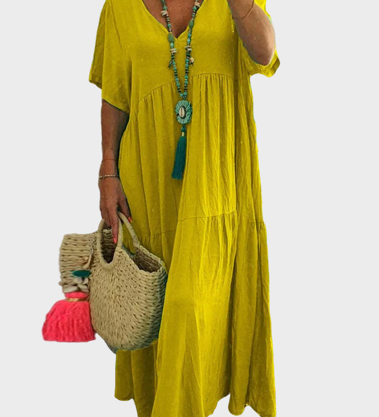 Linnea – Vestit maxi suau amb volants i escot en forma de V