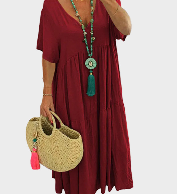 Linnea – Vestit maxi suau amb volants i escot en forma de V