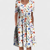 Raquel - Vestit Midi Elegant