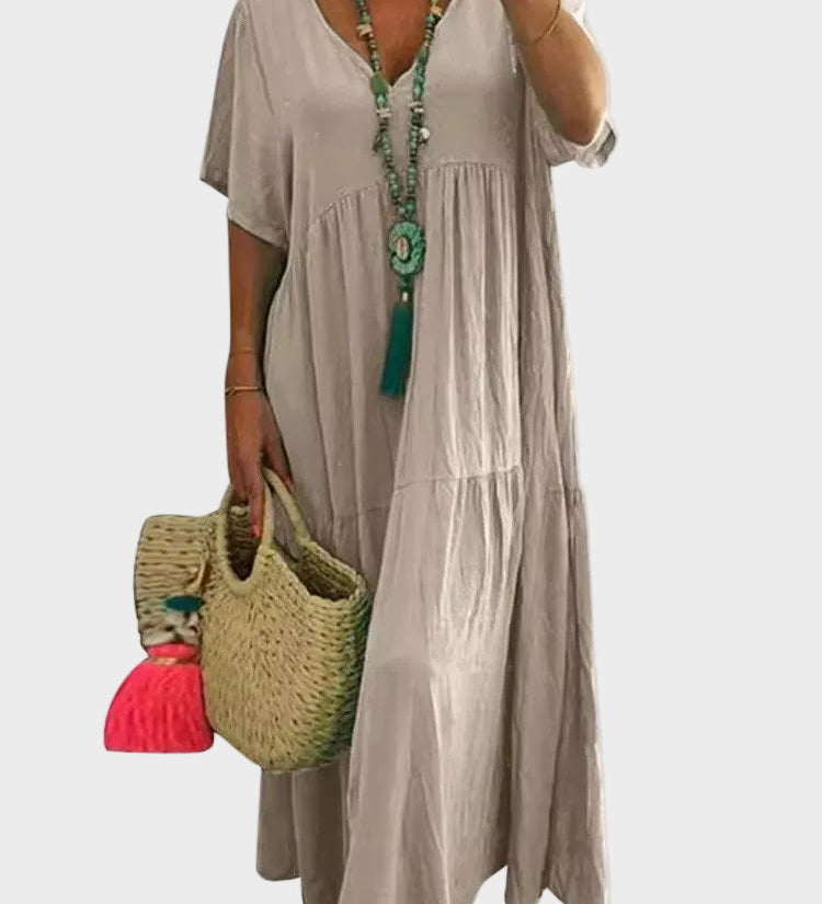 Linnea – Vestit maxi suau amb volants i escot en forma de V