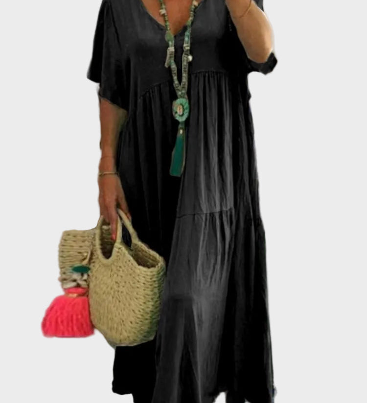 Linnea – Vestit maxi suau amb volants i escot en forma de V