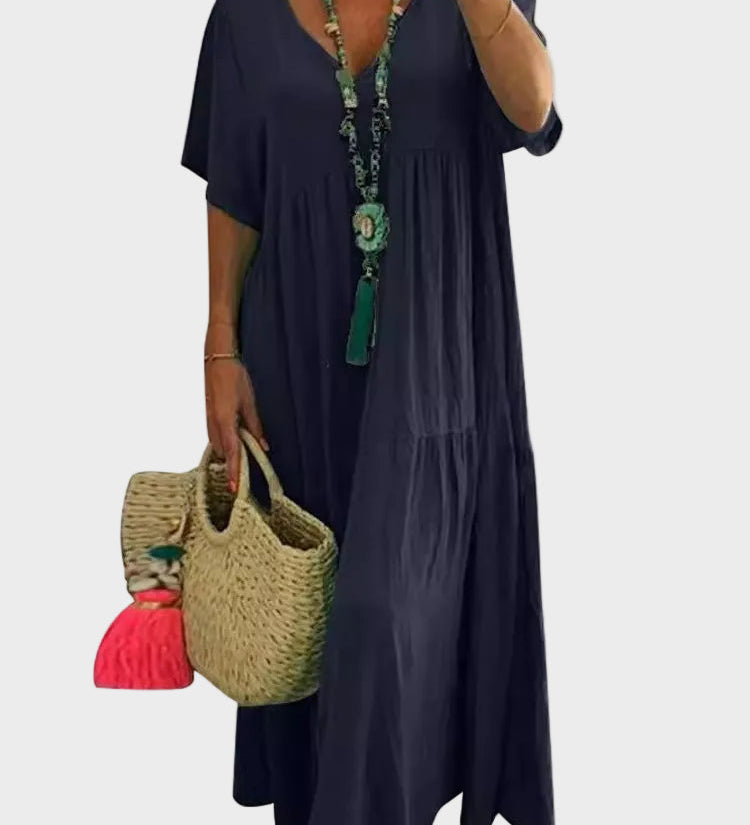 Linnea – Vestit maxi suau amb volants i escot en forma de V