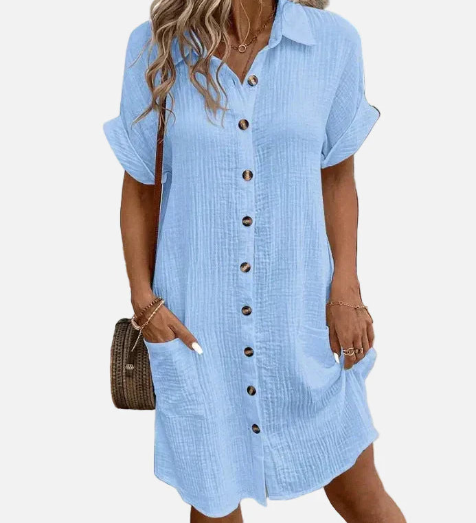 Vestit camisero de màniga curta amb botons i butxaques davanteres per a dona