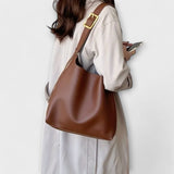 Lora. – Bossa d'estil elegant de cuir