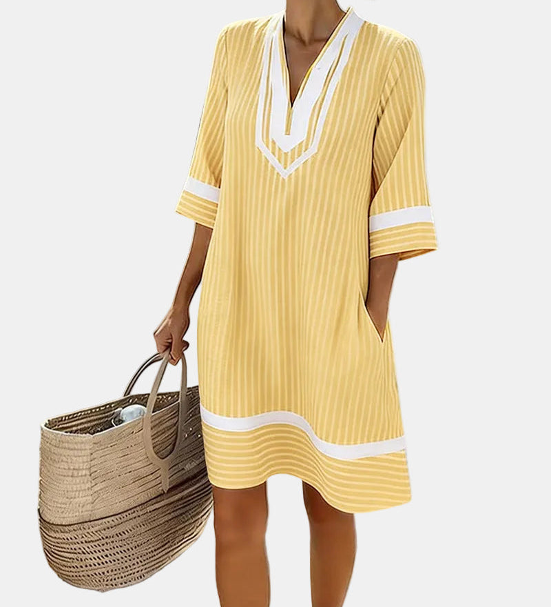 Klara™ | Vestit lleuger a ratlles amb escot en V